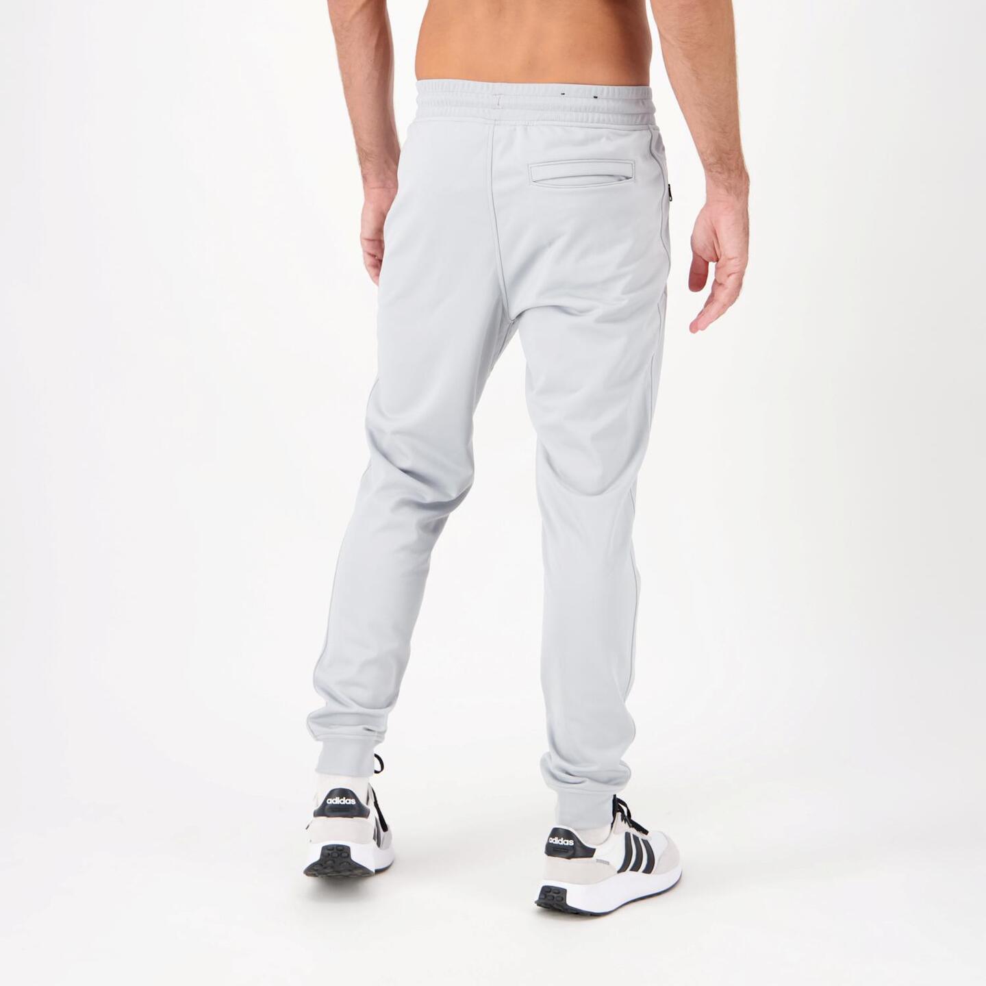 Pantalón Under Armour - gris - Pantalón Largo Hombre