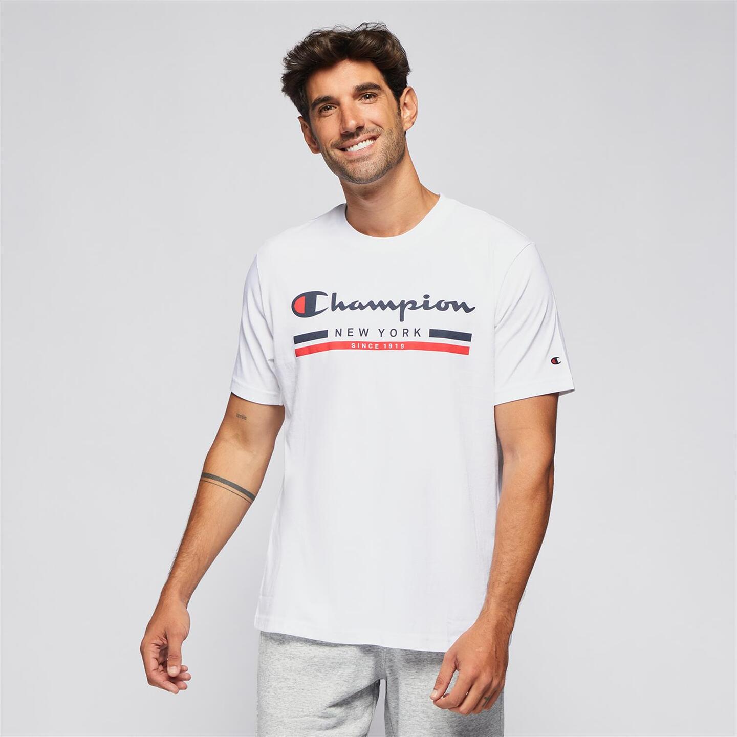 Camiseta champion blanca hombre sale