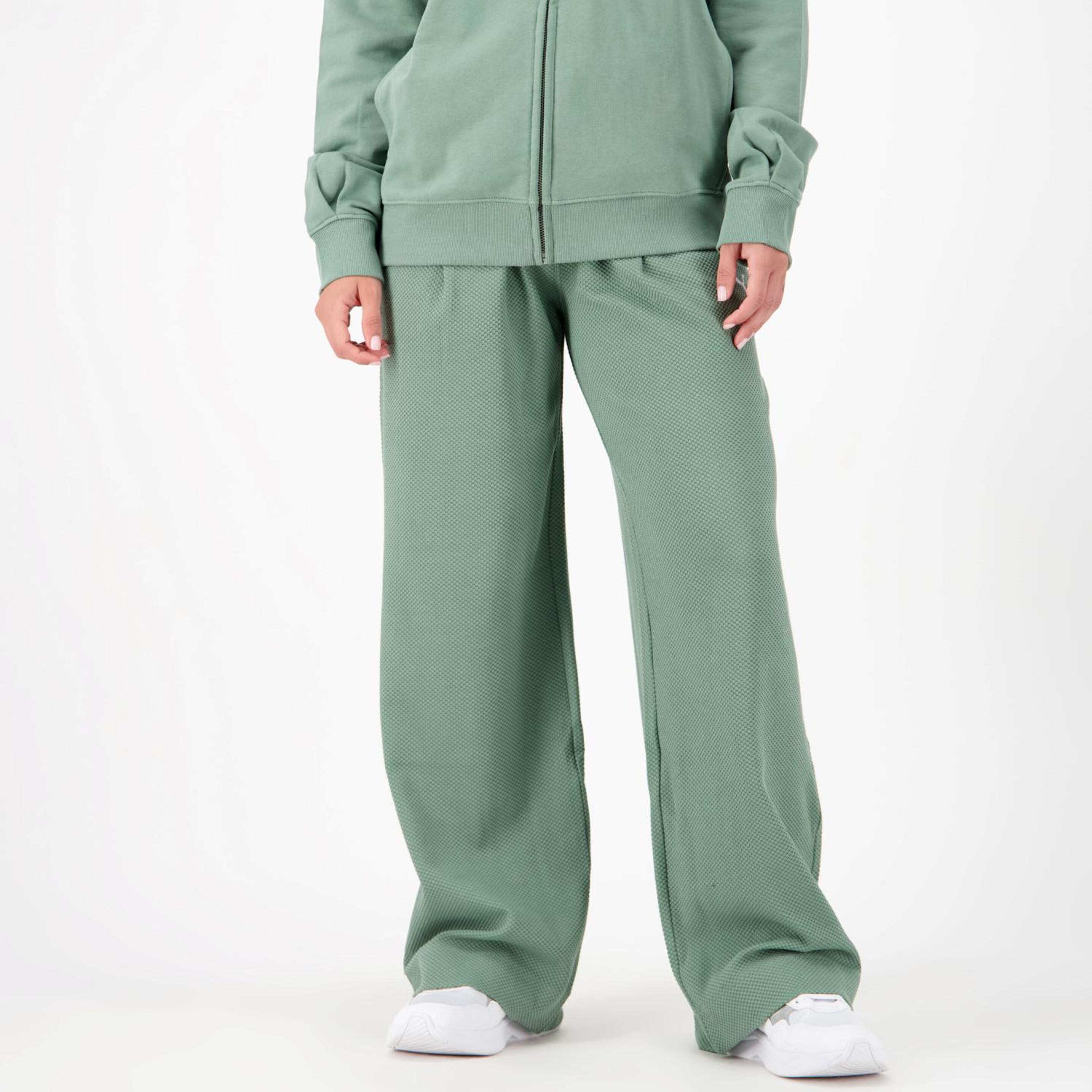 Puma Her - verde - Pantalón Mujer