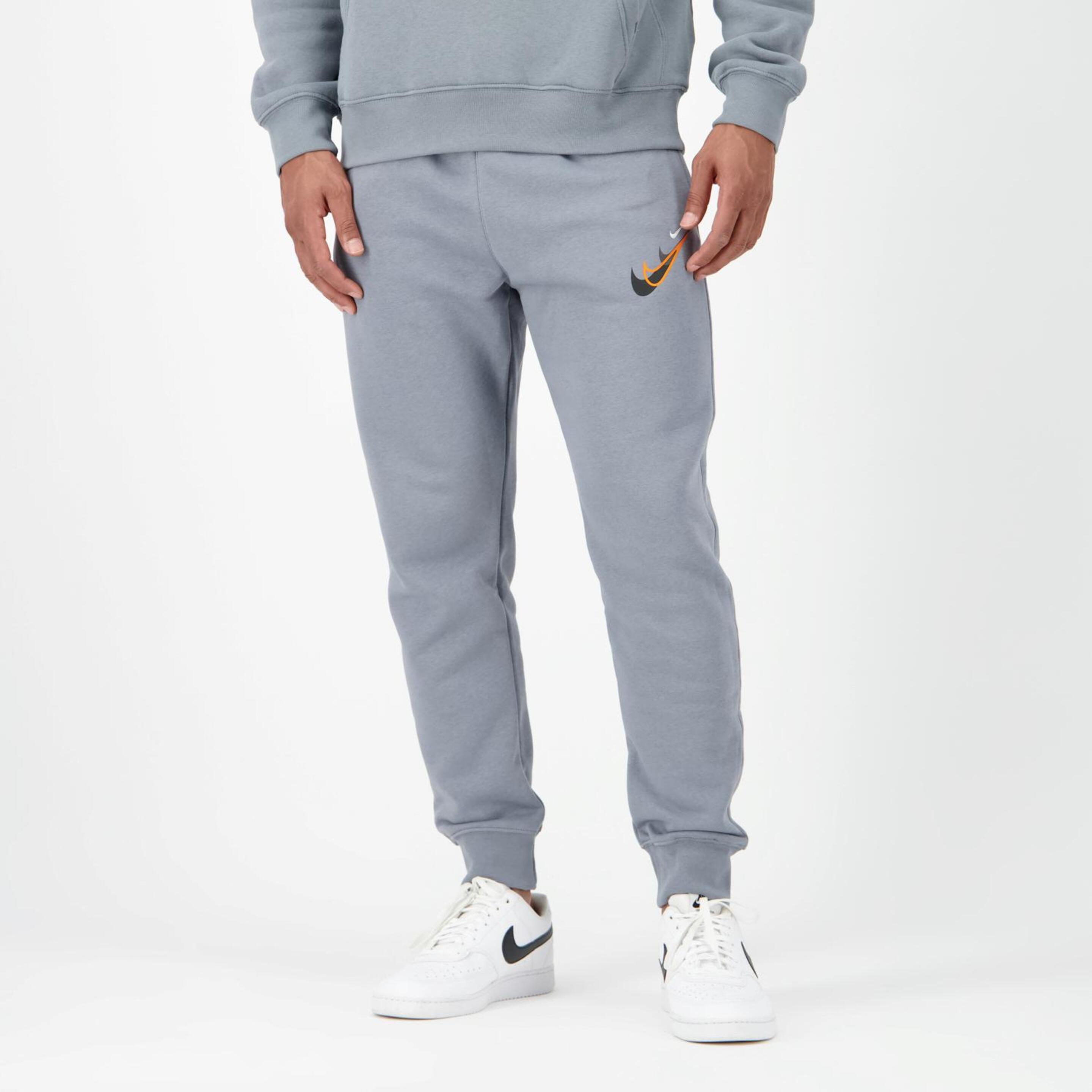 Nike T100 - gris - Pantalón Largo Hombre