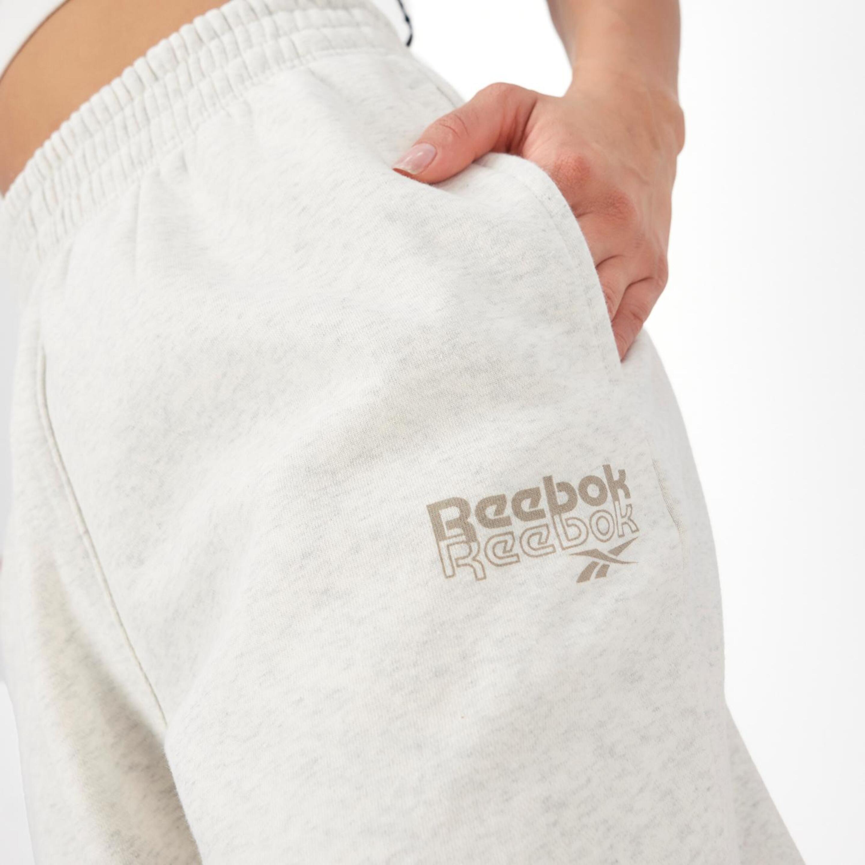 Reebok Rie - Blanco - Pantalón Puño Mujer