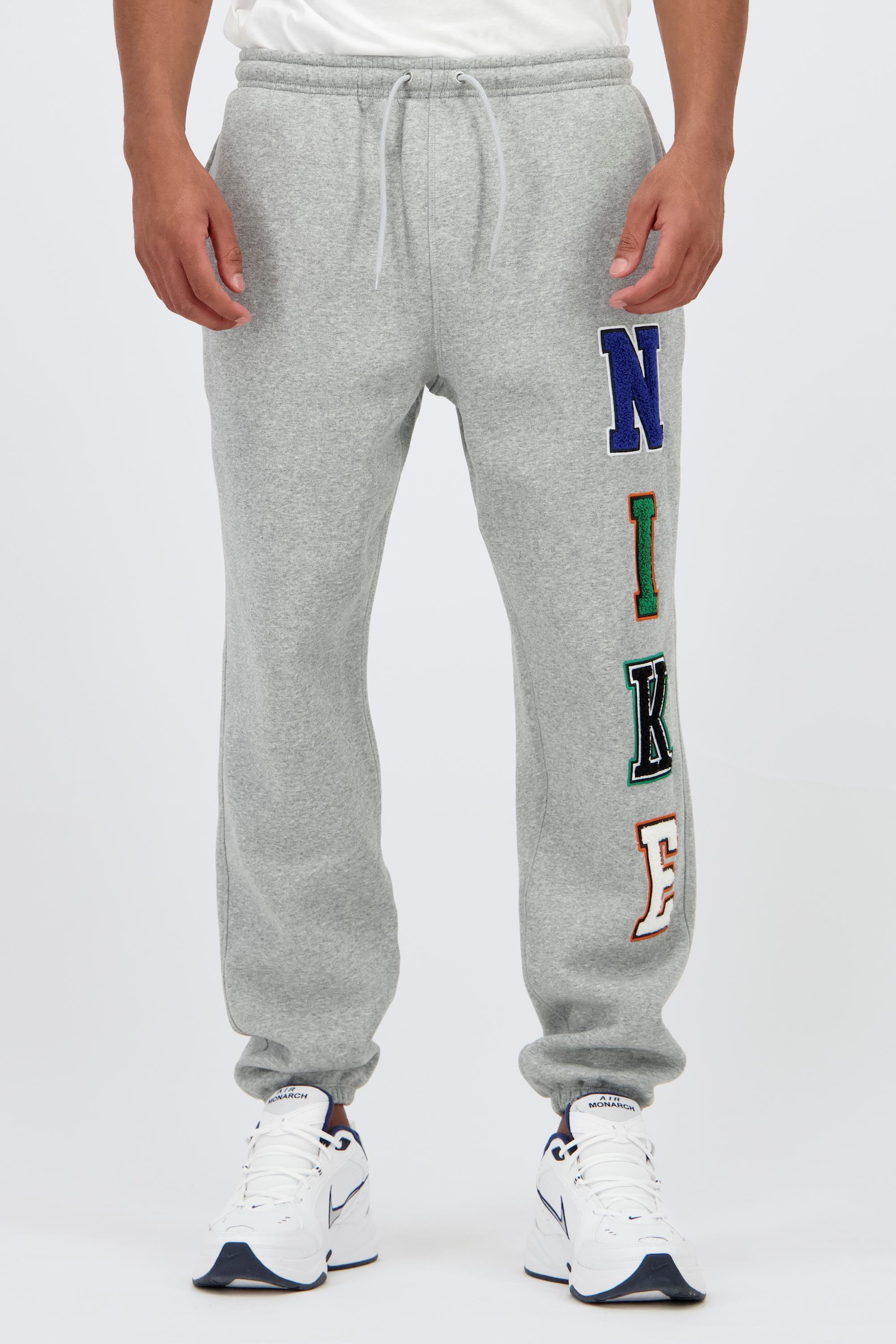 pantalon largo gris nike